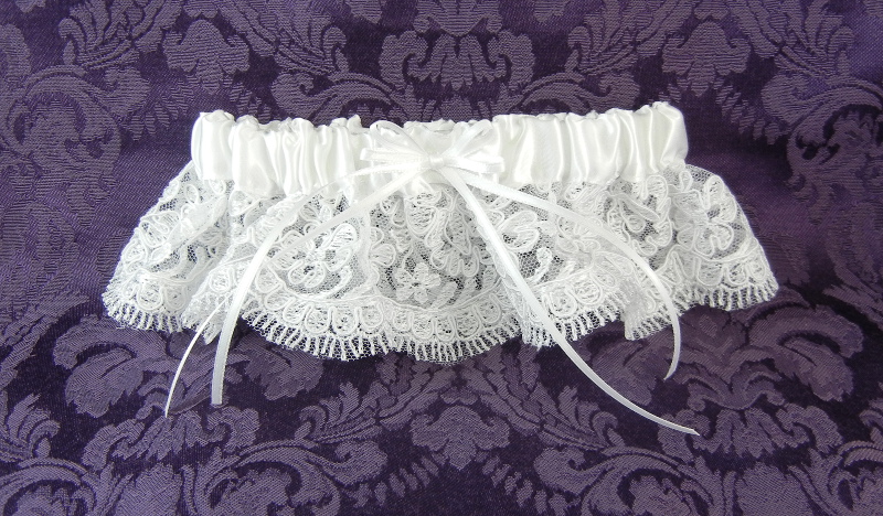 Fine re-embroidered Lace Garter